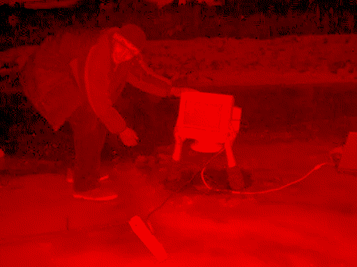 two slavic boys playing solitaire in the middle of the night on a crt monitor being held above a hole in the ice